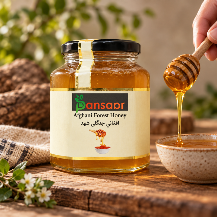 Afghani Forest Honey with a wooden honey dipper